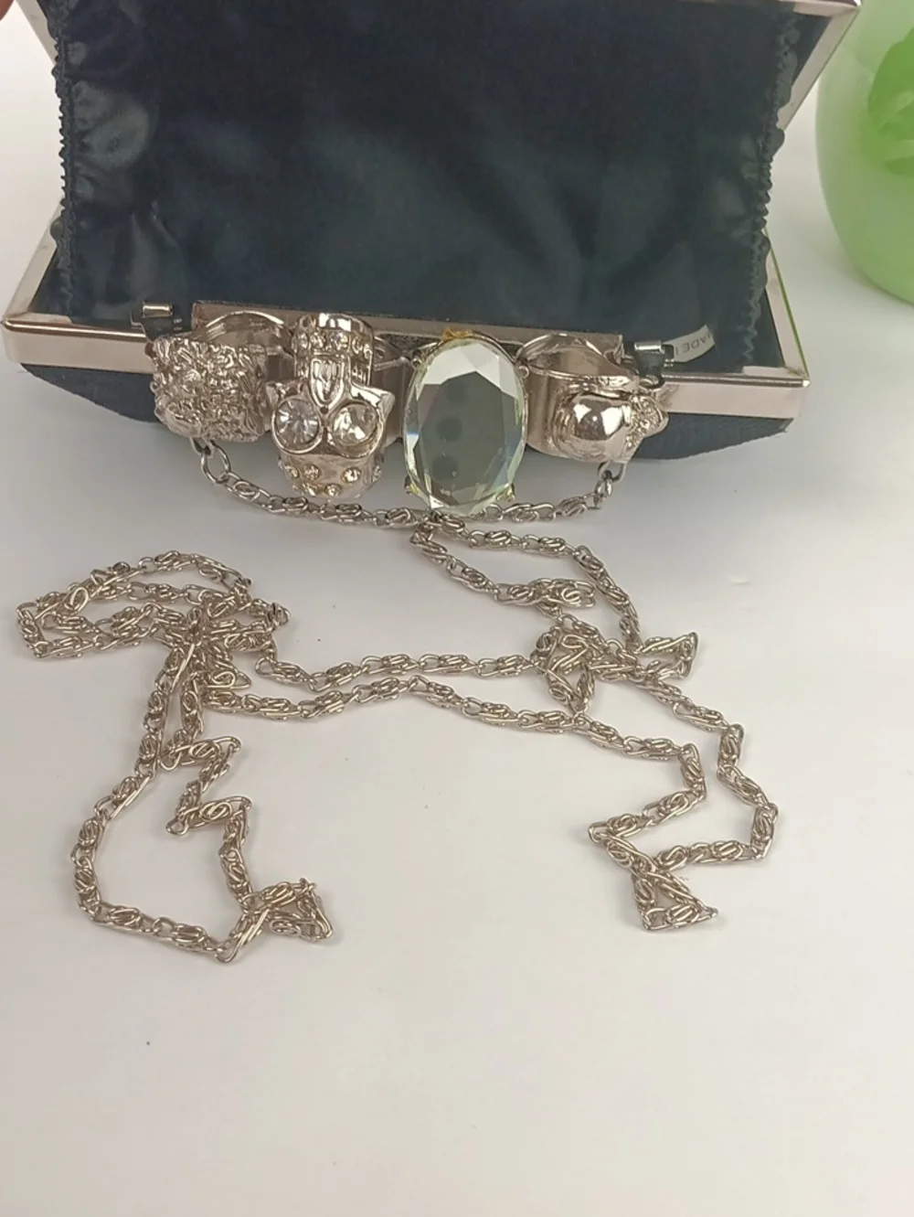 Women’s Black Lace Hard Shell Knuckle Duster Clutch with Silver Skull Detail